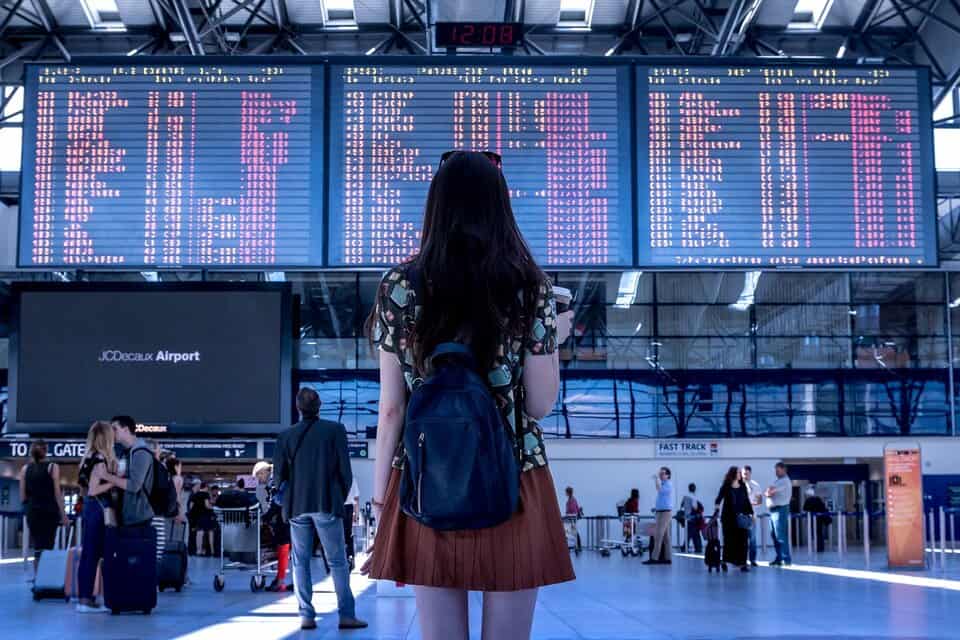 Solo female traveler in international airport